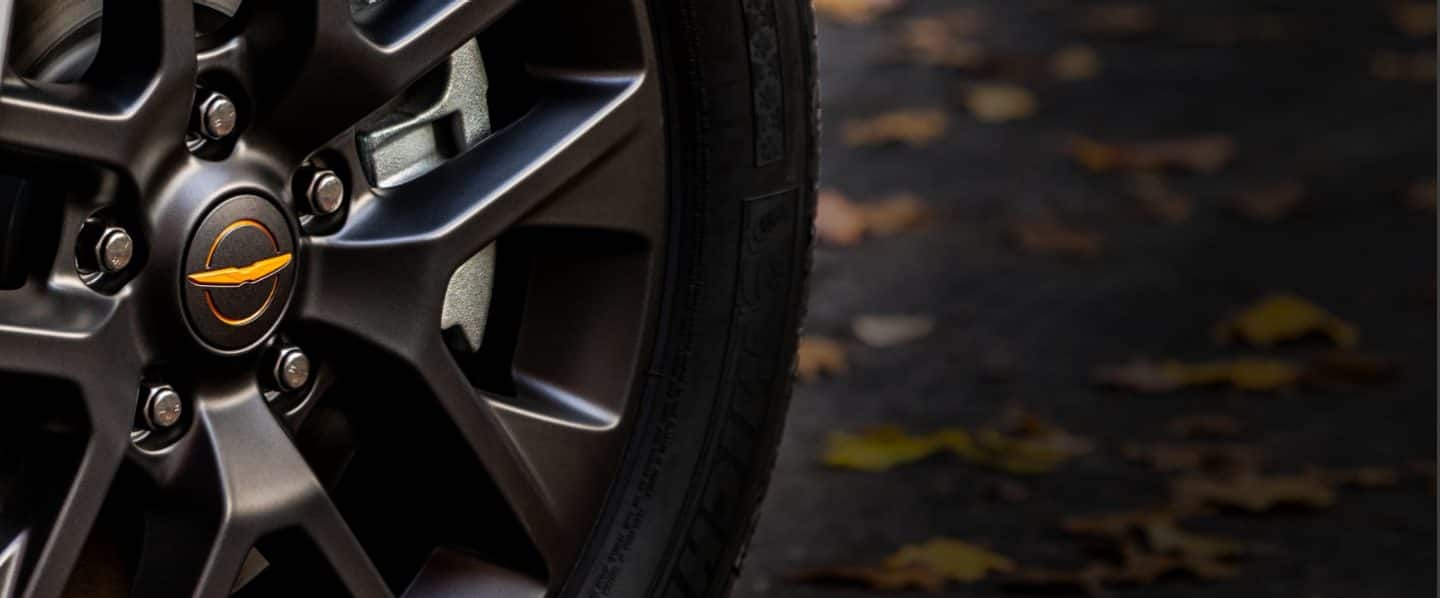 An extreme close-up of a wheel on the 2023 Chrysler Pacifica Road Tripper. 