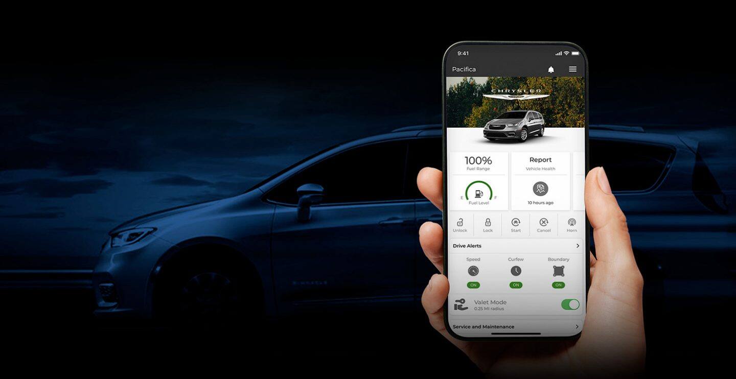 A smartphone displaying a page from the Chrysler app, with a darkened profile of a Chrysler Pacifica in the background.