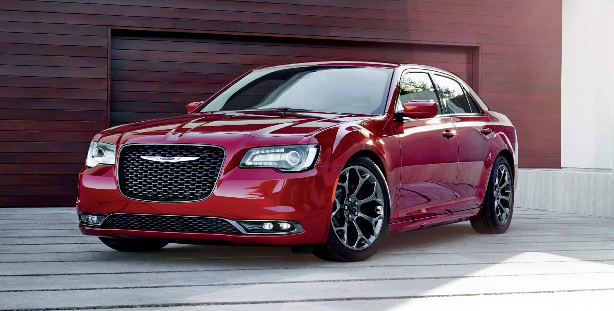 Red 2018 Chrysler 300 on driveway