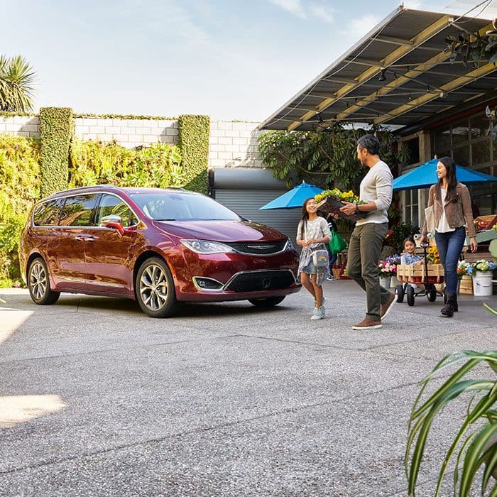 2019 Chrysler Pacifica Best New Family Car Family Walking Towards A Parked Chrysler Pacifica At Garden Center