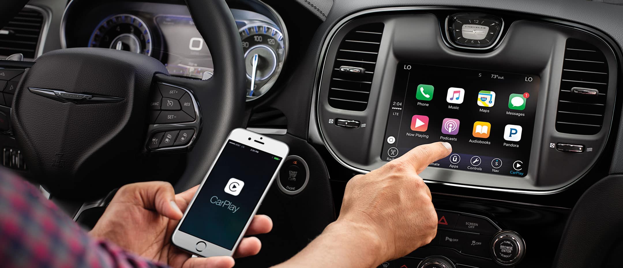 The driver information digital cluster display in the 2023 Chrysler 300 showing the vehicle speed and the name of the music station that's playing.