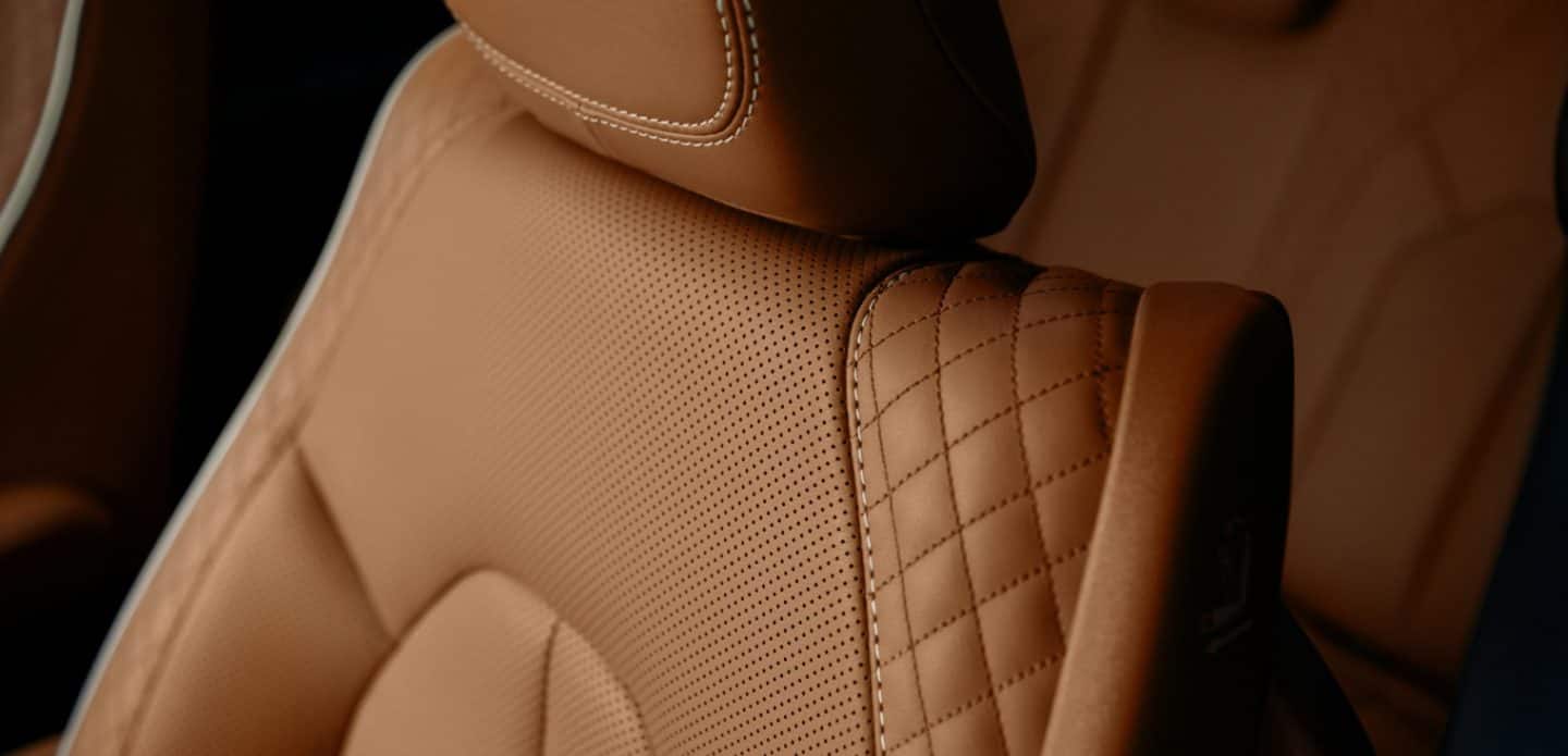 Display A close-up of the fabric and stitching on the seats in the 2023 Chrysler Pacifica Pinnacle.