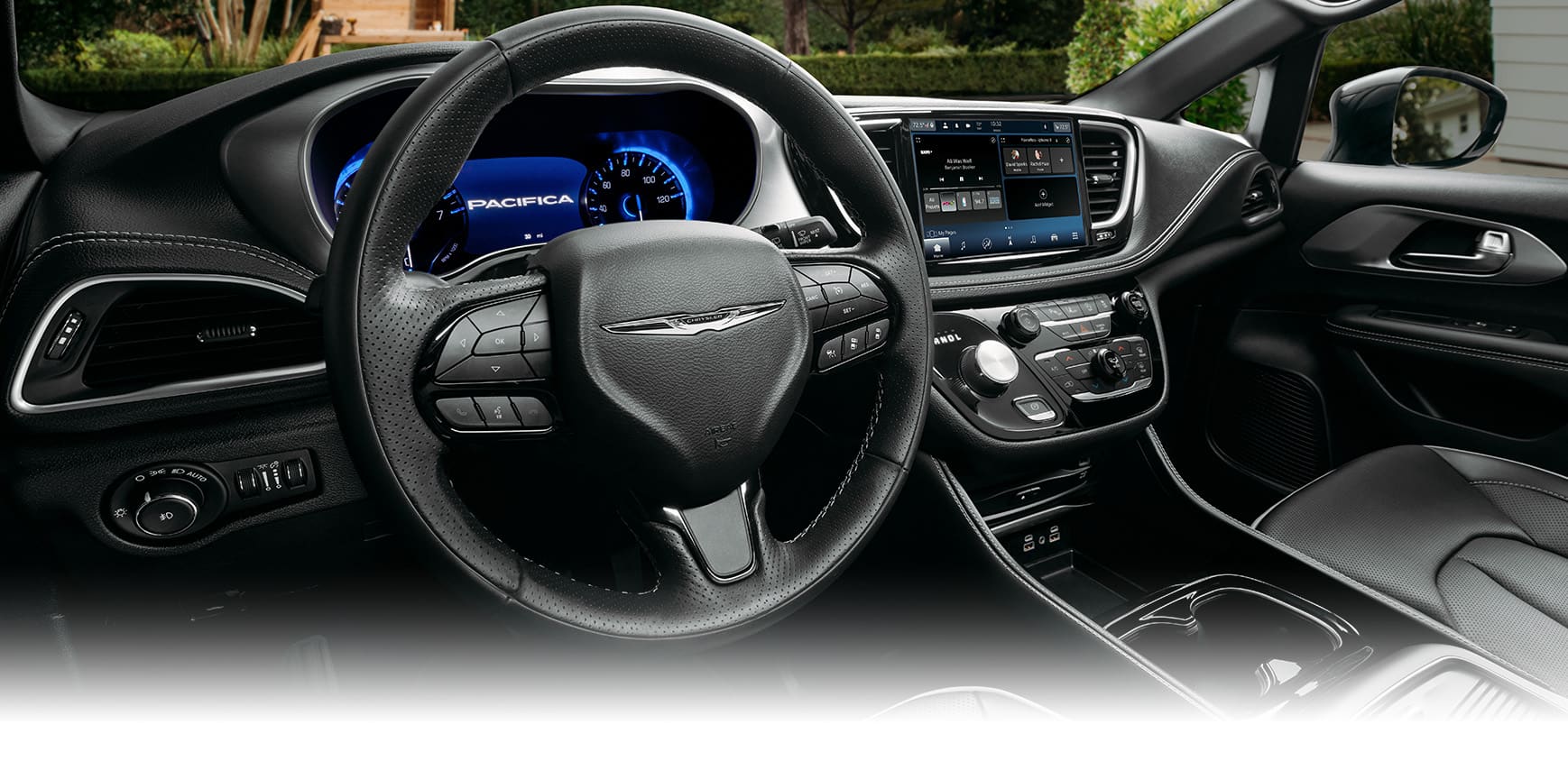 The steering wheel, Driver Information Digital Cluster, Uconnect touchscreen and center stack controls in the 2024 Chrysler Pacifica Plug-In Hybrid.