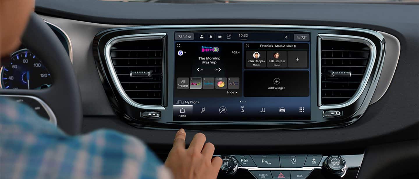 Display The Uconnect touchscreen in the 2025 Chrysler Voyager LX displaying a radio selection.