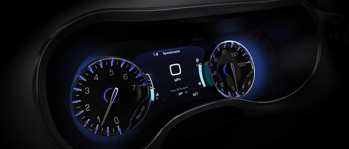 Display A close-up of the Digital Cluster Display in the 2025 Chrysler Voyager with gauges on the two ends.