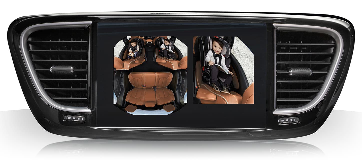 The Uconnect touchscreen in the 2026 Chrysler Pacifica Plug-In Hybrid displaying a split-screen from the FamCam, of the full and partial second row.