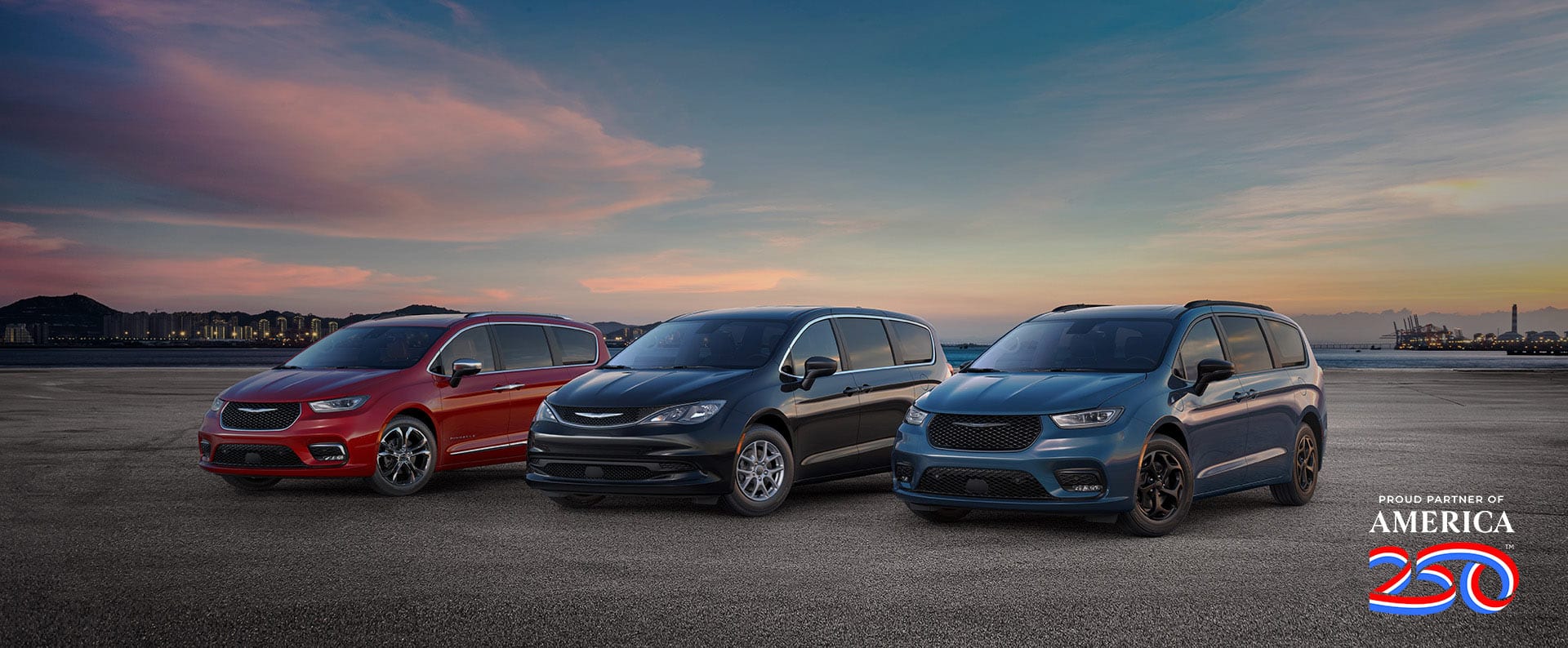 The 2025 Chrysler Brand minivan lineup: from left to right, a red Chrysler Pacifica Pinnacle, a black Chrysler Voyager LX and a blue Chrysler Pacifica Hybrid Select with the Premium S Appearance Package. Proud Partner of America 250.