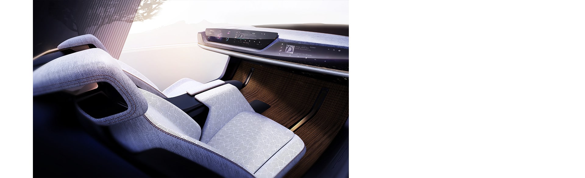 A front driver-side angle of the silver Chrysler Halcyon Concept vehicle parked outside a tunnel.